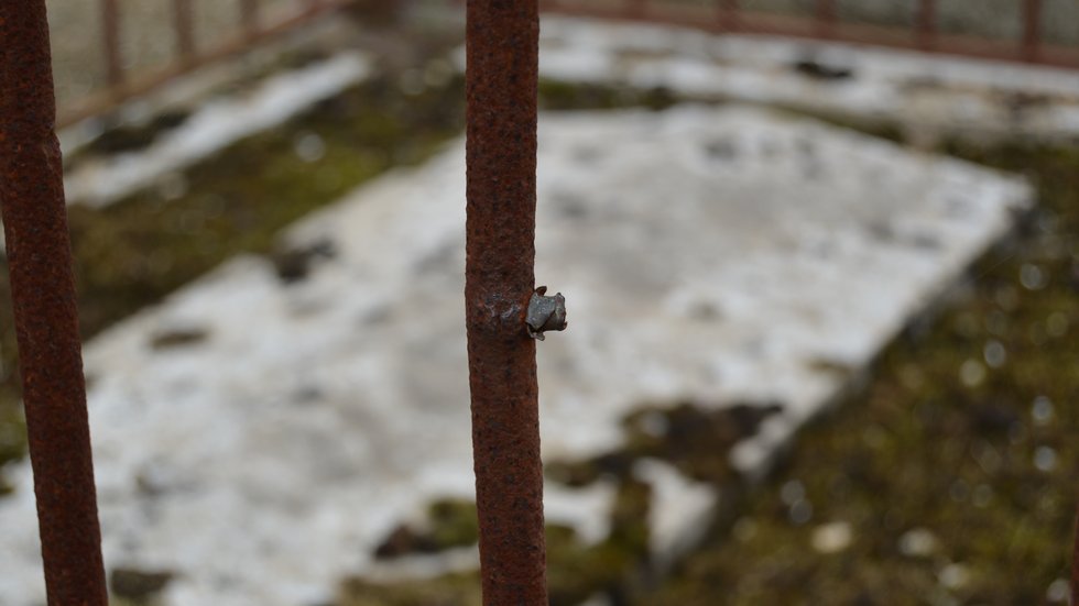 Bullet in railing at Cauquigny Church, La Fière causeway