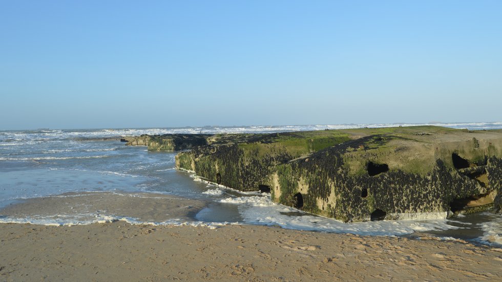 Mulberry harbour remains on the beach at Arromanches