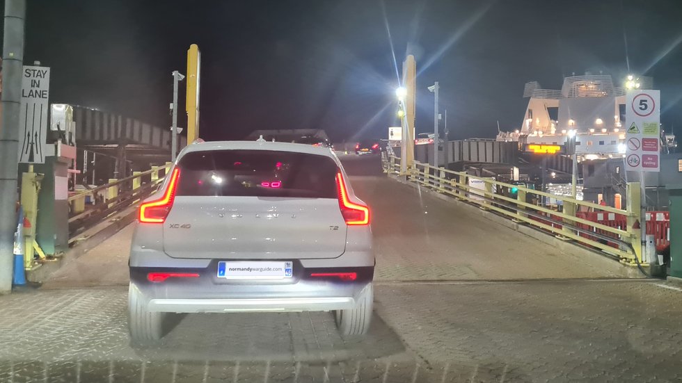 Car driving up the ramp to board the night ferry from Portsmouth to Caen