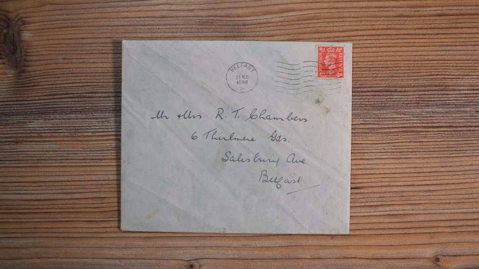 Photograph of the front of an envelope postmarked 1948, made from a repurposed GSGS 4250 map sheet