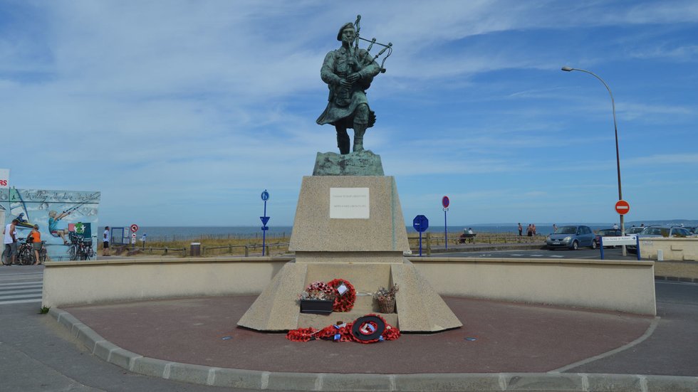 Statue of Bill Millin the D-Day piper at Colleville-Montgomery