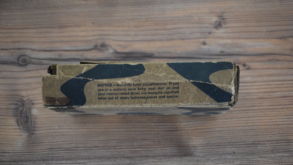 Side panel warning soldiers of malaria risk.