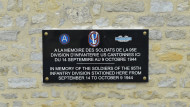 Close-up view of the 95th Infantry Division memorial at Mairie de Mandeville-en-Bessin