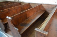 Pews in Angoville Au Plain Church stained with blood when it was used as an aid station in WW2
