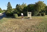 Memorial square dedicated to Captain M. Gauvin and plaque marking the original burial place of five Canadian soldiers, Colomby-Anguerny.