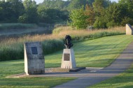 Memorial bust of Major John Howard and glider landing site markers, Pegasus Bridge