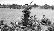 Piper Bill Millin playing for men of 45 (RM) Commando, 1st Special Service Brigade