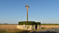 Queen’s Own Rifles First Night Memorial plaque mounted on the base of a calvary cross on the eastern edge of Anguerny along the D141 road.