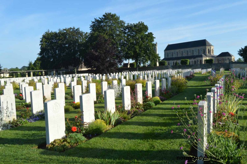 Ranville War Cemetery with Ranville church in the background
