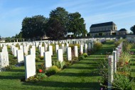 Ranville War Cemetery with Ranville church in the background