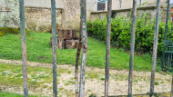 Bullet damage to railing opposite the church in Sainte-Mère-Église 