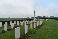 British graves and cross of sacrifice Secqueville-en-Bessin War Cemetery