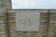 Secqueville-en-Bessin War Cemetery entrance message about cemetery