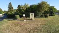 Régiment de la Chaudière temporary burial site plaque in Colomby-Anguerny, commemorating five Canadian soldiers killed on D-Day.